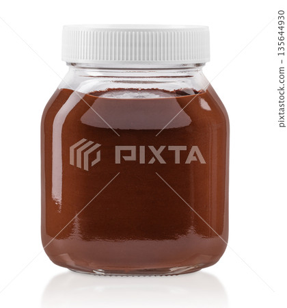 Chocolate spread in glass jar isolated on white background Chocolate spread in glass jar isolated on white background 135644930