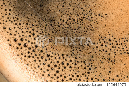Coffee foam bubbles macro texture background 135644975