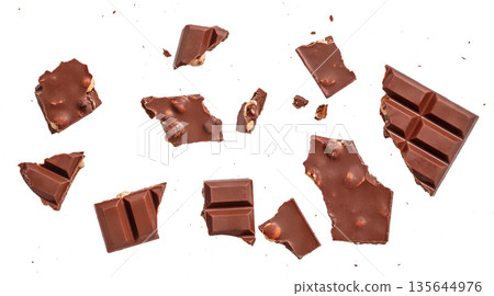 Broken chocolate pieces isolated on white background 135644976