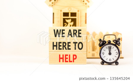 Support, help and we are here to help symbol. Concept words We are here to help on beautiful wooden blocks. Beautiful white background. Alarm clock. Business we are here to help concept. Copy space. Support, help and we are here to help symbol. Concept words We are here to help on beautiful wooden blocks. Beautiful white background. Alarm clock. Business we are here to help concept. Copy space. 135645204