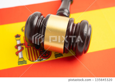 Spain Legal, justice and agreement, wooden court gavel on flag. Spain Legal, justice and agreement, wooden court gavel on flag. 135645320