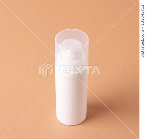 Top view cosmetic bottle, minimal skincare packaging background Top view cosmetic bottle, minimal skincare packaging background 135645712