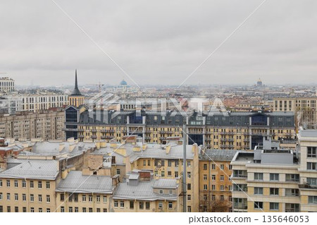 Fogcovered skyline showing old rooftops and narrow alley glimpses Fogcovered skyline showing old rooftops and narrow alley glimpses 135646053