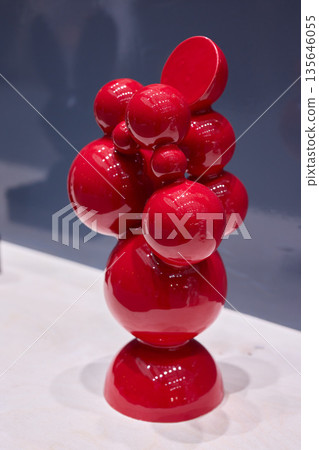 Reflective lacquered spheres form artful modern interior decoration 135646055
