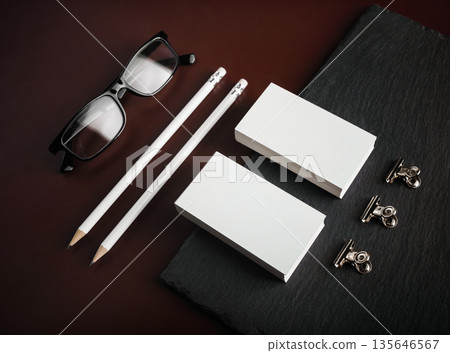 Business cards, pencils, glasses 135646567