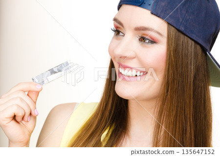Girl with chewing gum. Girl with chewing gum. 135647152