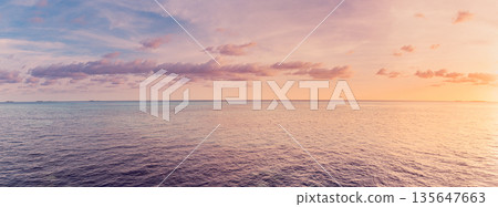Panoramic super wide ocean sunset colorful sky horizon peaceful nature ecology background Panoramic super wide ocean sunset colorful sky horizon peaceful nature ecology background 135647663