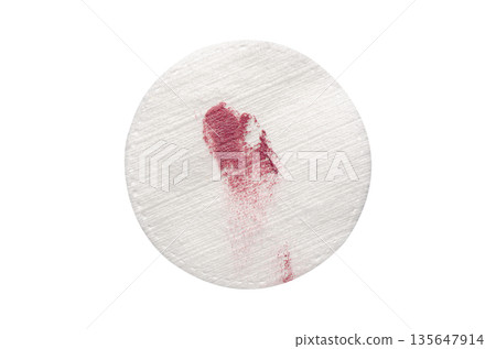 A cotton pad for cosmetic procedures. Isolated on a white background A cotton pad for cosmetic procedures. Isolated on a white background 135647914