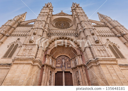 The west facade of Palma Cathedral, also known as La Seu, with its main portal and rose window, in Palma, Mallorca, Balearic Islands, Spain, Europe The west facade of Palma Cathedral, also known as La Seu, with its main portal and rose window, in Palma, Mallorca, Balearic Islands, Spain, Europe 135648181