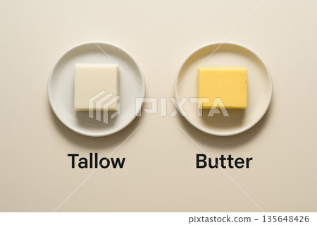 Tallow and butter comparison on neutral background, healthy fat concept 135648426