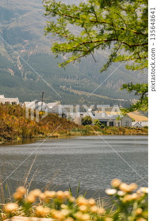 Residential houses build near lake surrounded by nature in South Africa Residential houses build near lake surrounded by nature in South Africa 135648641