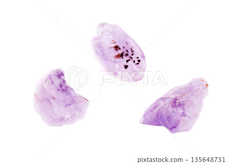 Isolated amethyst quartz specimen with raw crystalline formations. Natural mineral cluster showcases 135648731