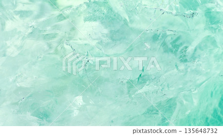 amethyst crystal displays frozen textures with cool blue hues. The icy surface of the gemstone 135648732