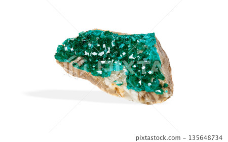 Stunning green mineral stone specimen emerald-green dioptase crystal formations, isolated Stunning green mineral stone specimen emerald-green dioptase crystal formations, isolated 135648734