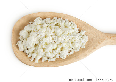 Cottage Cheese, Curd in wooden spoon isolated on white background. Top view. Flat lay 135648760
