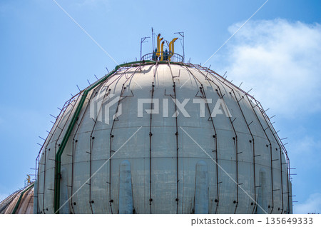 The futuristic design of the Repsol gas station in Gijon, Asturias, Spain, resembles a scene from a Star Wars movie. 135649333