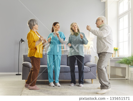 Senior people having fun with doctor, nurse amusing, psychotherapy, care assistant, retirement home Senior people having fun with doctor, nurse amusing, psychotherapy, care assistant, retirement home 135651571