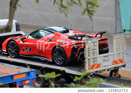 Car carrier loaded with sports cars 135652713