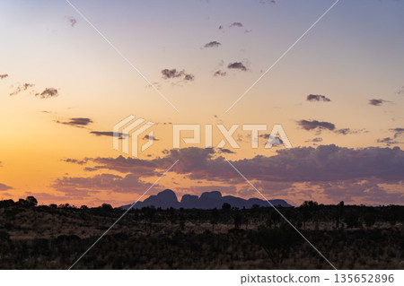 Dramatic sunset over iconic silhouette of Kata Tjuta, Australia Dramatic sunset over iconic silhouette of Kata Tjuta, Australia 135652896