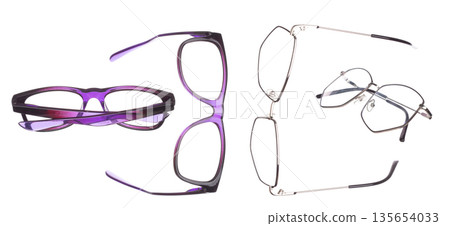 Purple Fashion Glasses fly in air showing many angle rotated. Fashion trend glasses for confident work and beautiful wearing is good for shape of head. White background isolated 135654033