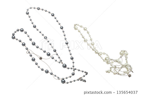Pearl bead style necklet fly in air. Deep sea pearl bead necklace as gemstone for fashion ornament decorative items. Fashion ornament necklace to add more style. White background isolated 135654037