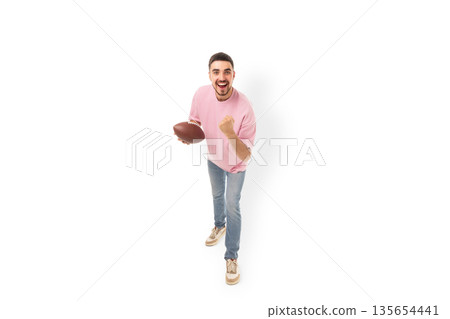 Player shows excitement while holding a football, isolated, PNG 135654441