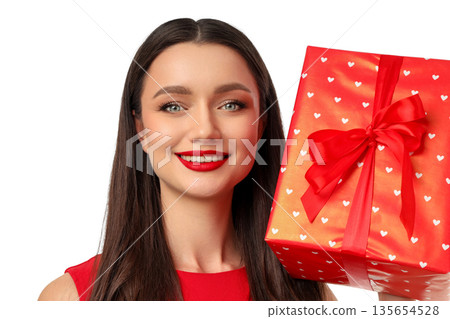 Woman with long hair holds a heart-patterned gift, isolated, PNG Woman with long hair holds a heart-patterned gift, isolated, PNG 135654528