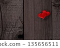 Two Red Hearts on Rustic Wooden Texture with Romantic Symbolism. Valentines Day and Love Wallpaper Background. 135656511