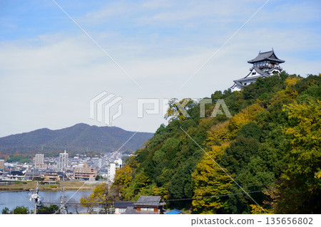 Autumn dog Mountain castle tower Autumn dog Mountain castle tower 135656802