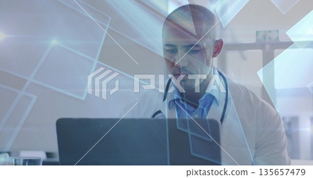 Physician in lab coat analyzing laptop in clinical office, with stethoscope and digital overlay Physician in lab coat analyzing laptop in clinical office, with stethoscope and digital overlay 135657479