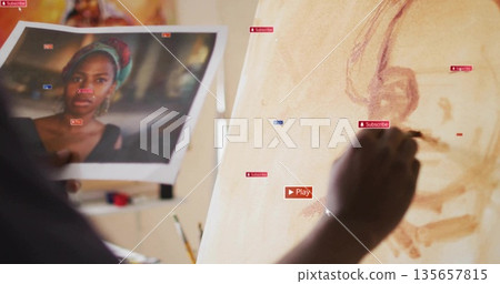 Painting artist applying tones on canvas in studio with printed reference and brush, copy space Painting artist applying tones on canvas in studio with printed reference and brush, copy space 135657815