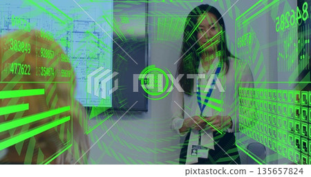 Interacting Chinese woman wearing ID badge scanning AR interface in meeting room, with blueprint Interacting Chinese woman wearing ID badge scanning AR interface in meeting room, with blueprint 135657824