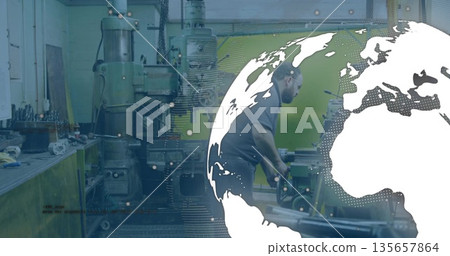 Technician wearing goggles using milling machine at fabrication shop globe graphic, copy space Technician wearing goggles using milling machine at fabrication shop globe graphic, copy space 135657864
