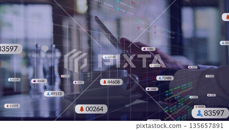 Showing man's hand holding smartphone over cafe desk, displaying metrics, with coffee cup  and  glas 135657891