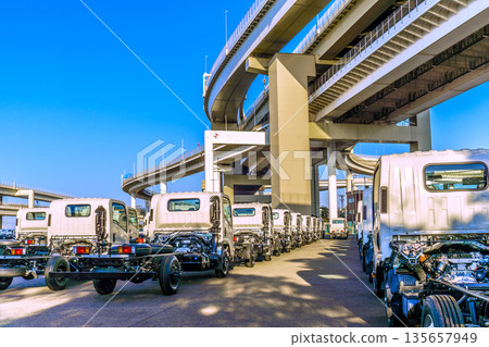 Yokohama cityscape in Japan Japanese economy...a row of trucks Yokohama cityscape in Japan Japanese economy...a row of trucks 135657949