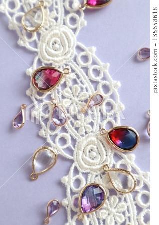 Colorful glass beads and ribbons Colorful glass beads and ribbons 135658618