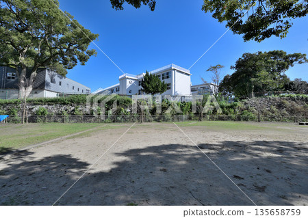 Higo Kumamoto Castle and the collapsed stone walls being preserved Higo Kumamoto Castle and the collapsed stone walls being preserved 135658759