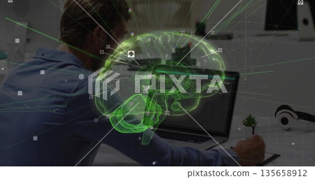 Man wearing blue shirt sketching 3D brain on tablet at office desk, with stylus, copy space Man wearing blue shirt sketching 3D brain on tablet at office desk, with stylus, copy space 135658912