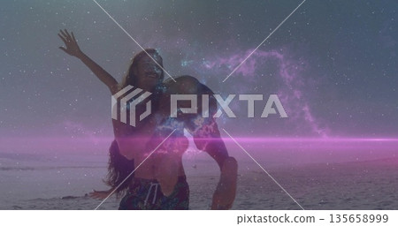 Muscular shirtless man carrying swimwear-clad woman on sandy ocean shoreline, cosmic nebula sky Muscular shirtless man carrying swimwear-clad woman on sandy ocean shoreline, cosmic nebula sky 135658999