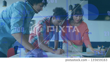 Analyzing data, colleagues writing notes at office table, with printed charts and sticky notes Analyzing data, colleagues writing notes at office table, with printed charts and sticky notes 135659163
