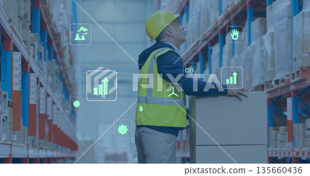 Warehouse worker wearing helmet hi-vis vest placing box in warehouse with digital icons, copy space Warehouse worker wearing helmet hi-vis vest placing box in warehouse with digital icons, copy space 135660436