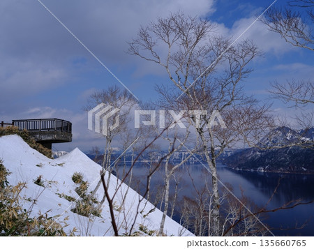 View of Lake Mashu and Kamui Terrace with remaining snow View of Lake Mashu and Kamui Terrace with remaining snow 135660765