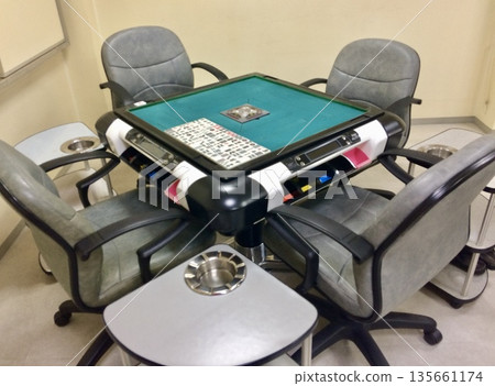 A fully automatic black and white mahjong table installed in a mahjong parlor A fully automatic black and white mahjong table installed in a mahjong parlor 135661174