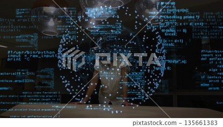 Woman wearing blouse and pants manipulating holographic data sphere above table in lab, with code 135661383