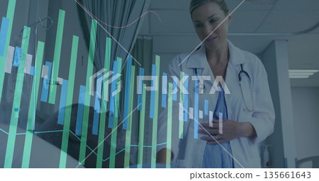 Assessing doctor with stethoscope monitoring patient in exam room, health data overlay, copy space Assessing doctor with stethoscope monitoring patient in exam room, health data overlay, copy space 135661643