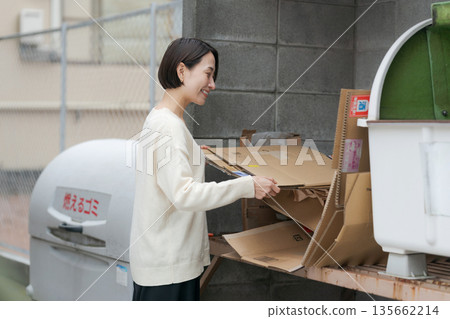 Woman throwing away trash 135662214