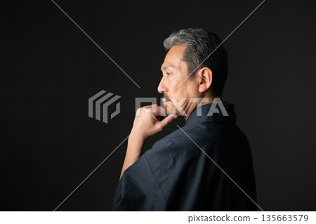 A man wearing a kimono 135663579