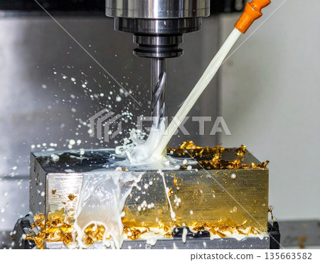 A cinematic shot of a large industrial CNC vertical machining center in operation A cinematic shot of a large industrial CNC vertical machining center in operation 135663582