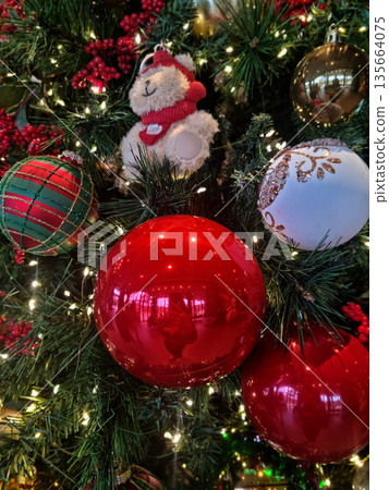 It's a Christmas tree with ornaments. It's a Christmas tree with ornaments. 135664075