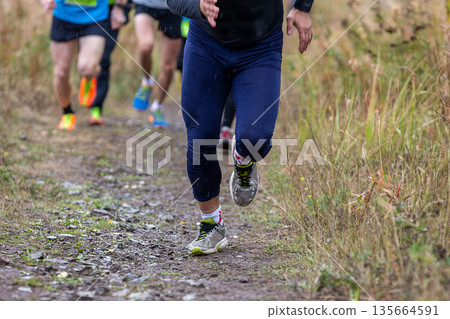 Leading runner leads group athletes 135664591